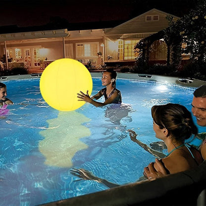 Belro inflatable waterproof pool lamp floating in a backyard pool, providing colorful outdoor lighting for home and garden use