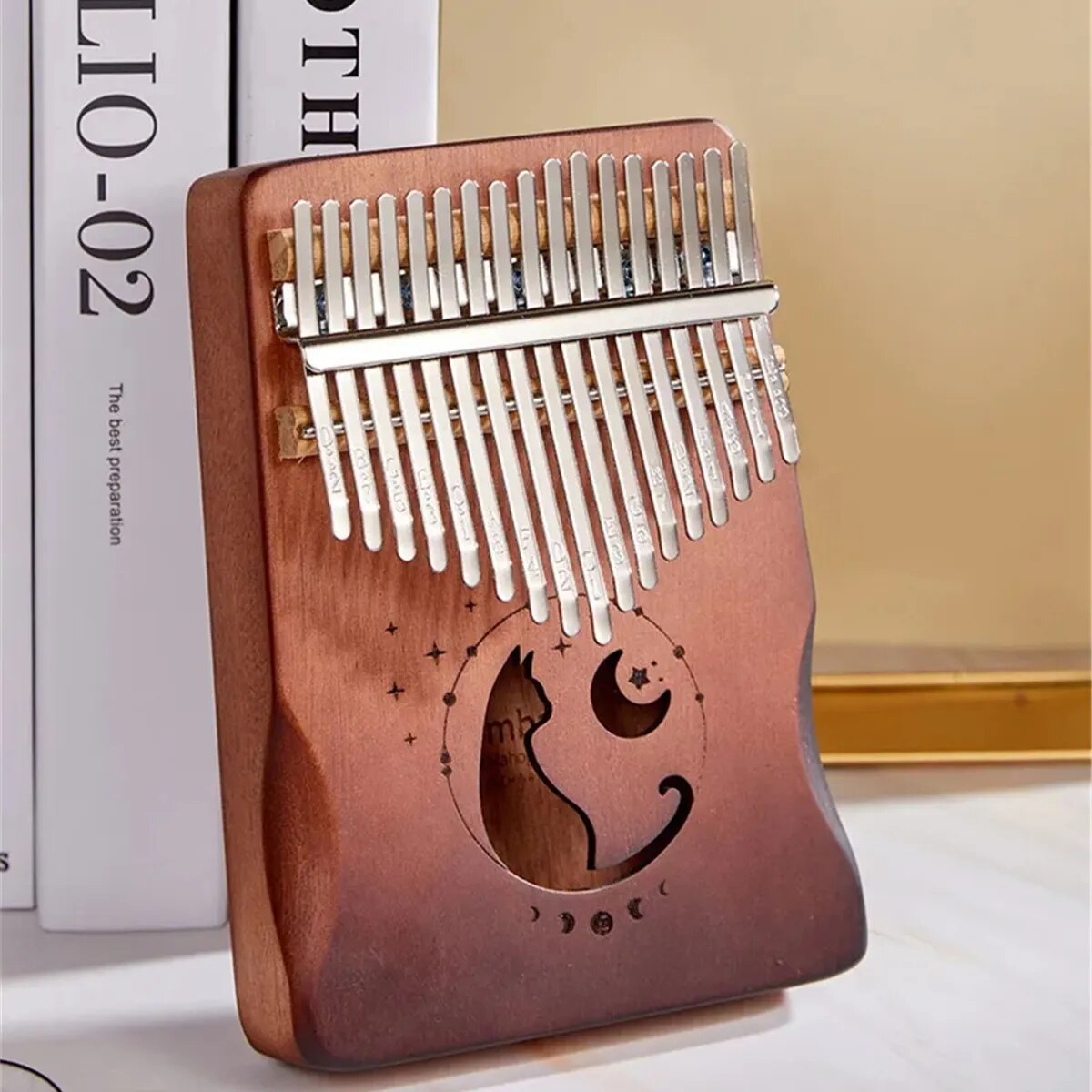 Belro Professional 17K Kalimba thumb piano with metal tines and wooden body, showcasing its compact electronic design.
