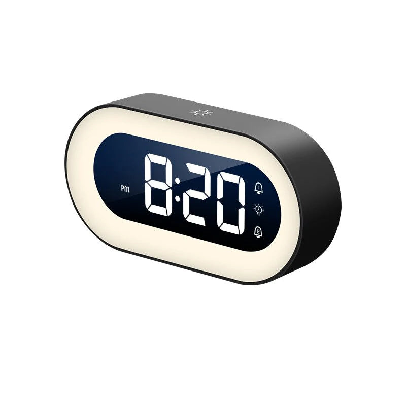 Belro Gentle Light Alarm Clock showing a soft illuminated display on a bedside table, ideal for calming wake-up lighting.