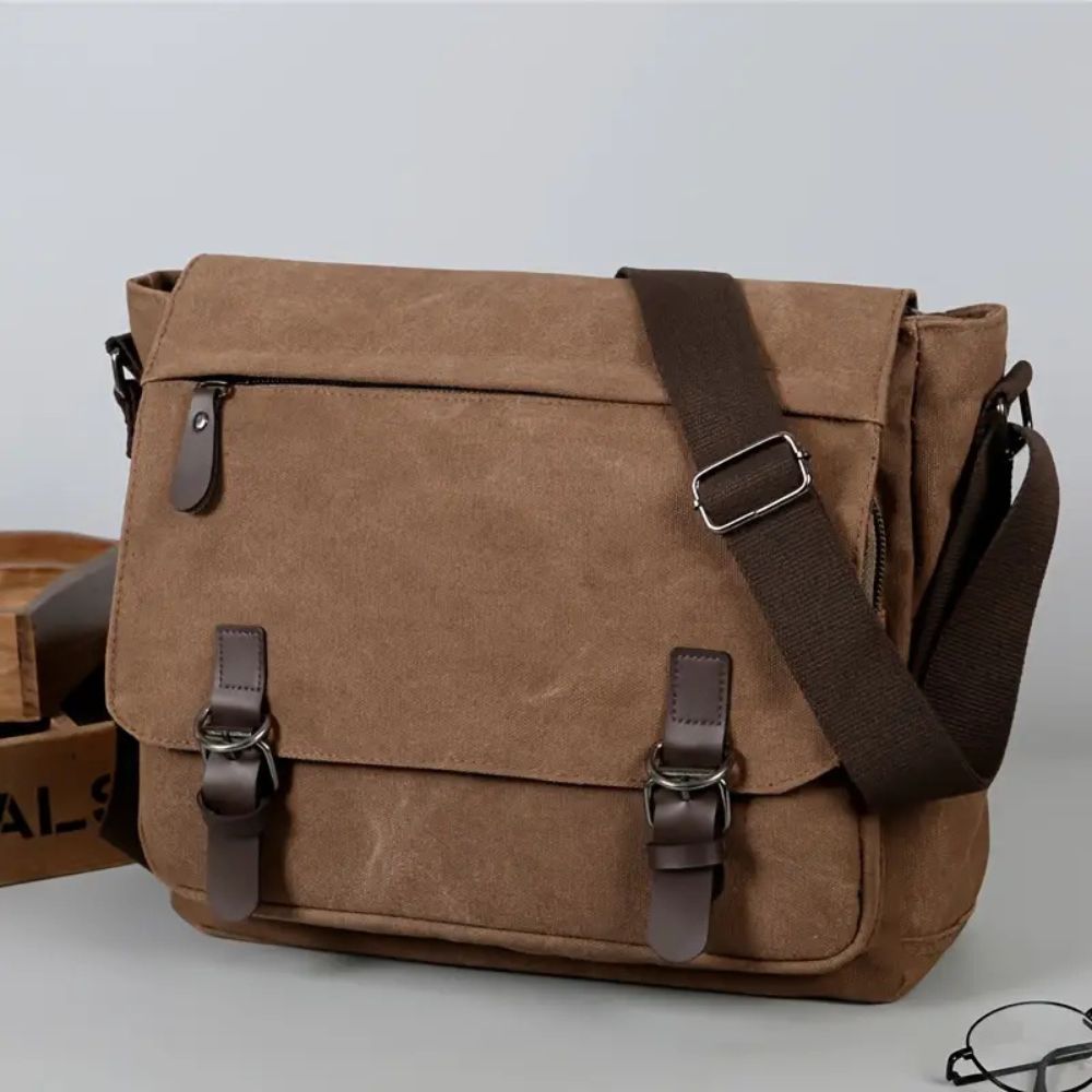 Men's canvas satchel messenger sling bag by Belro, showing a durable, stylish bag with adjustable strap and multiple compartments.