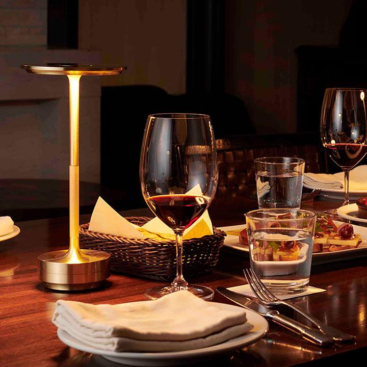 Belro portable cordless table lamp with adjustable light intensity, compact desk lighting for versatile use.