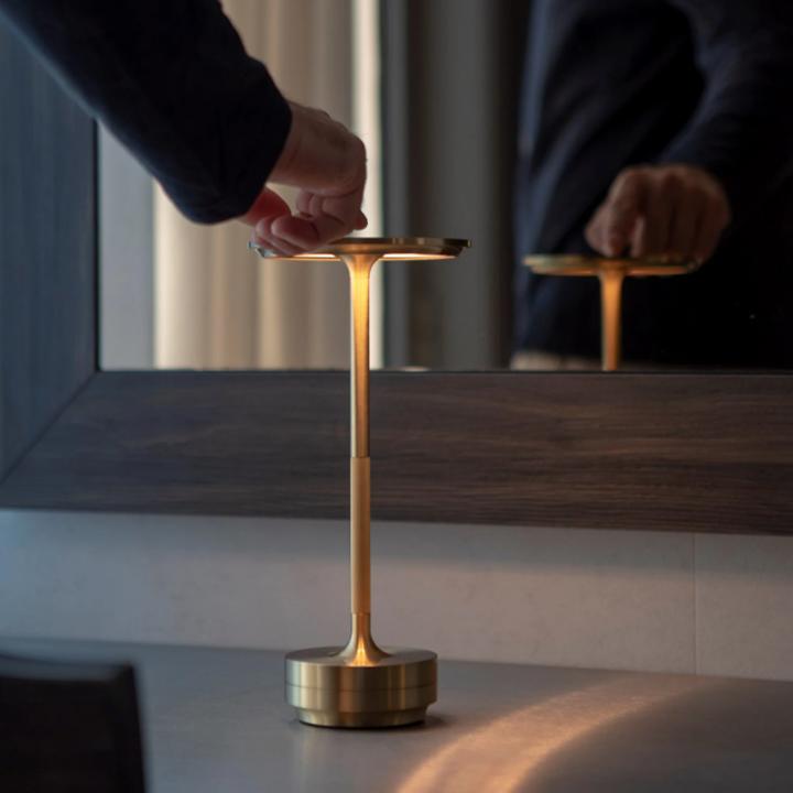 Belro portable cordless table lamp with adjustable light intensity, compact design, perfect for desk or workspace lighting.