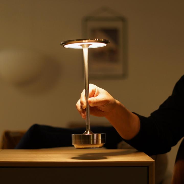 Belro portable cordless table lamp with adjustable light intensity, compact electronic desk lighting for versatile illumination.