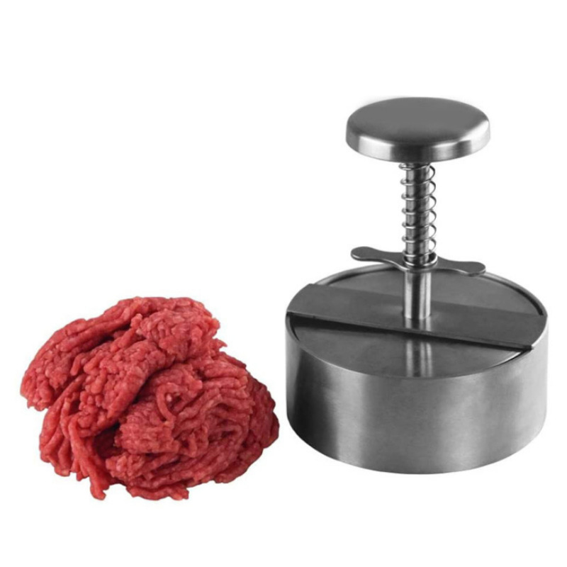 Stainless steel Belro press for kitchen and dining, showcasing its polished metal surface and ergonomic handle.