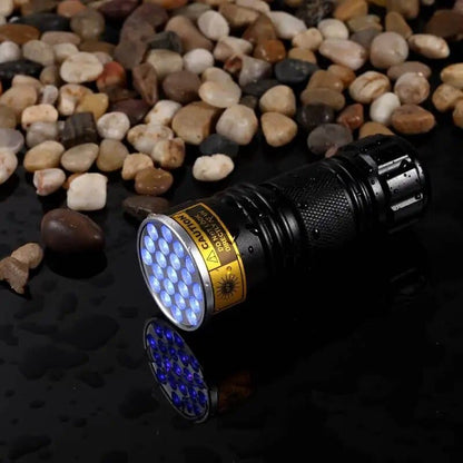 Belro 21 LED pocket UV lamp showing compact black device with multiple LED lights for UV illumination.