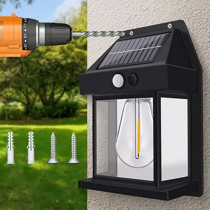 Belro outdoor solar LED lights with motion sensor installed on a garden wall, providing automatic outdoor lighting.