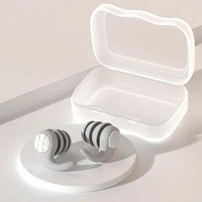 Gray Belro noise-canceling silicone earplugs designed for sleeping, providing effective sound reduction and comfort.