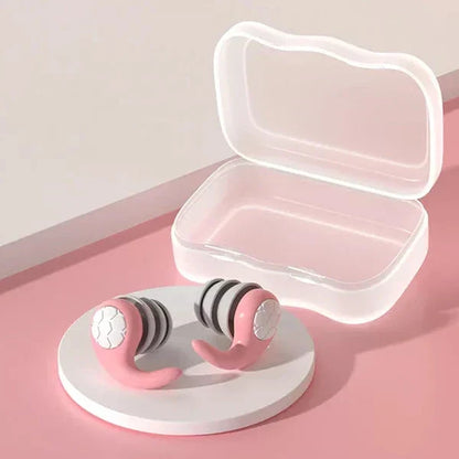 Pink silicone earplugs for sleeping with noise-canceling design, ideal for restful rest and noise reduction by Belro.