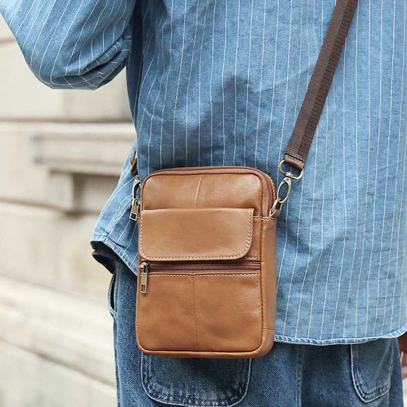 Small leather shoulder bag for men by Belro, featuring a compact design with a strap and textured leather surface.