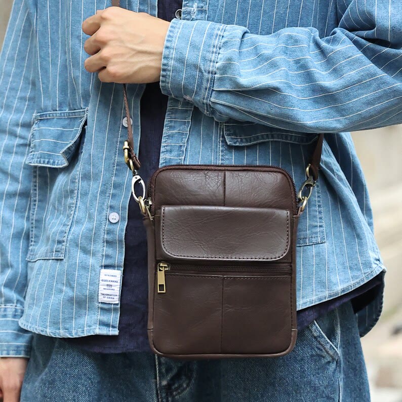 Small leather shoulder bag for men by Belro, stylish messenger bag with adjustable strap and compact design.