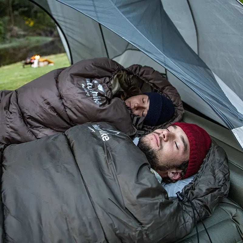 Belro ultra-lightweight outdoor sleeping bag spread open, showing its compact design and durable fabric for camping and backpacking.