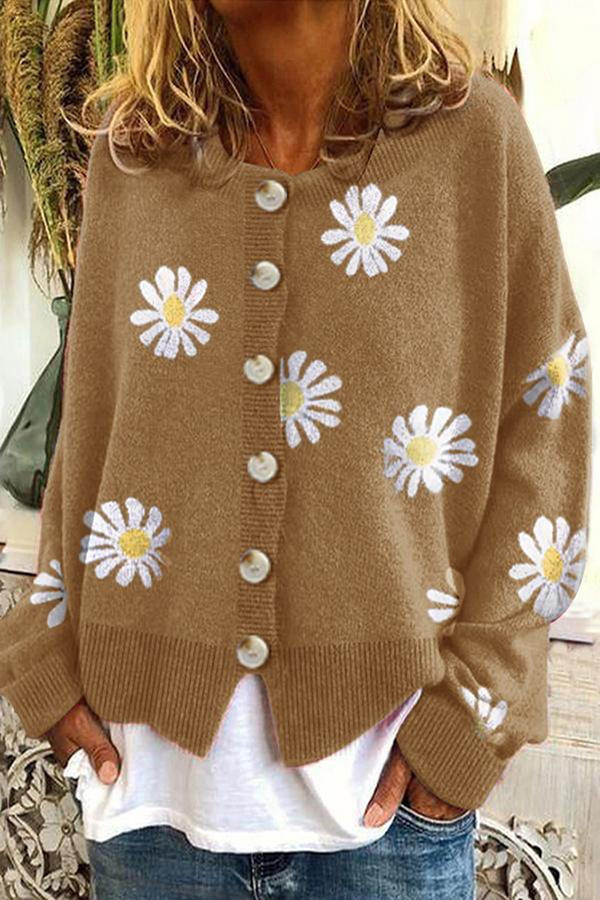 Belro floral embroidery knitted sweater with colorful floral patterns and detailed stitching on a cozy fabric backdrop.