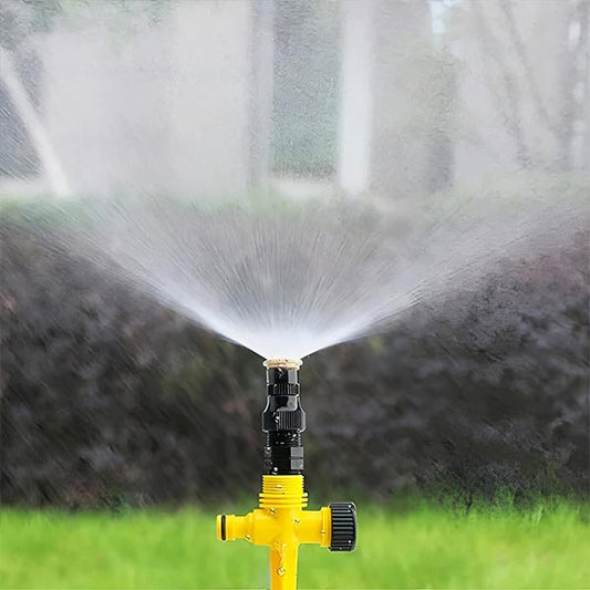 Belro 360 degree garden sprinkler set up outdoors, showing water spray pattern for efficient lawn and garden watering.