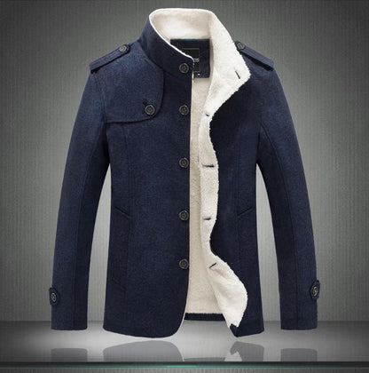 Belro classic wool trench coat hanging on a wooden hanger, showcasing its tailored fit and smooth fabric in a neutral color.