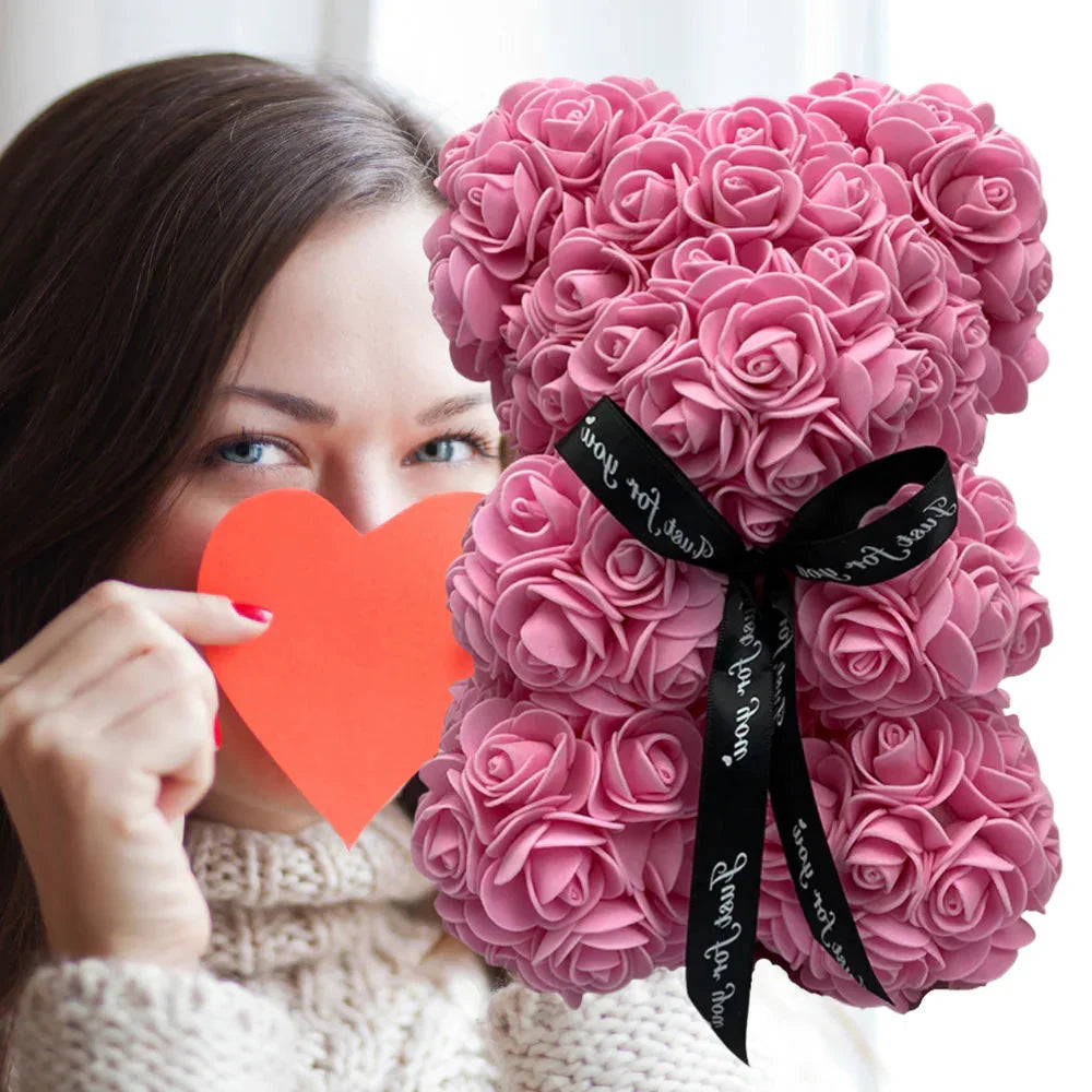 Belro Roses teddy bear, a plush romantic gift, dressed in clothing suitable for men, featuring soft rose-colored fabric and detailed design.