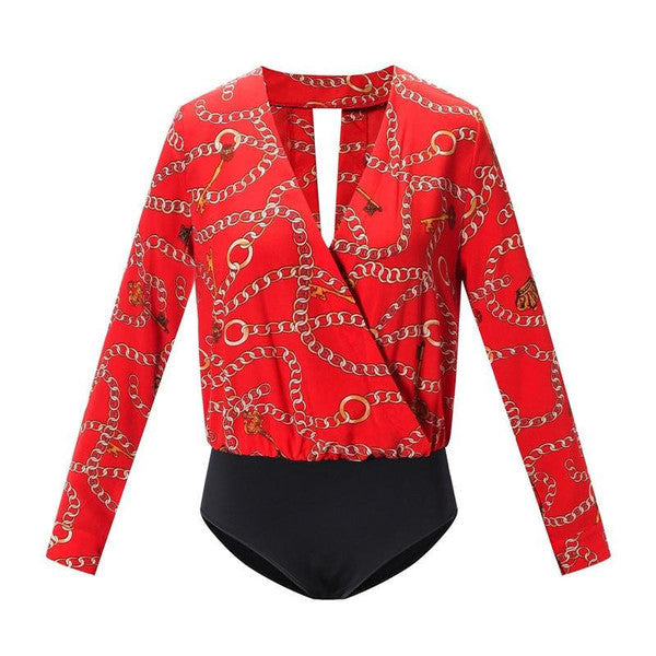 Vintage printed bodysuit by Belro featuring colorful floral patterns and fitted design, displayed on a mannequin.