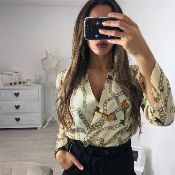 Vintage printed bodysuit by Belro featuring colorful patterns, form-fitting design, and long sleeves for stylish lingerie or undergarment wear.