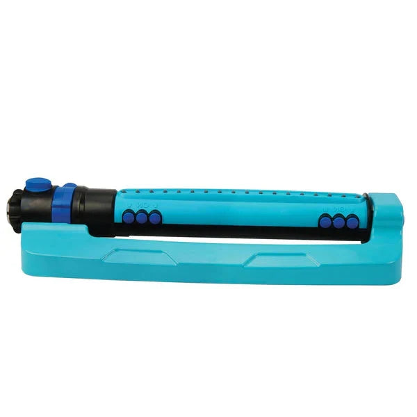 Belro wide range oscillating garden sprinkler system watering a lush lawn outdoors.