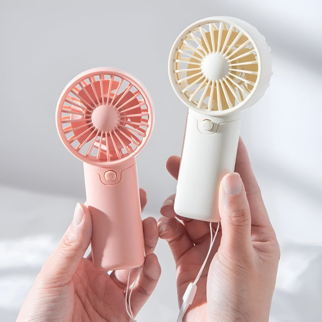 DecorsDeluxe ZenWave Traveler portable mini handheld fan with battery, compact design, and travel-ready cooling for on-the-go comfort.