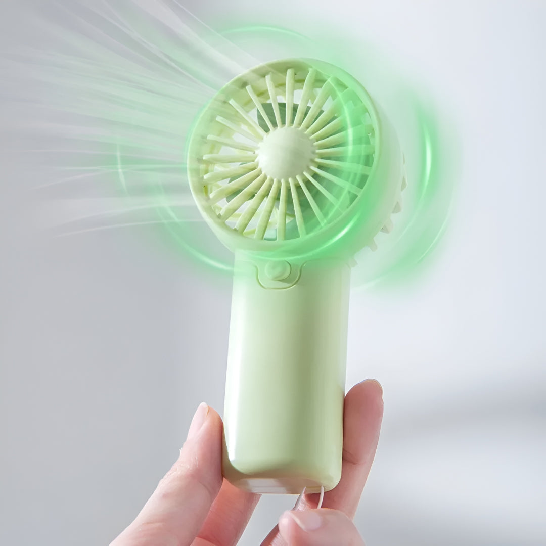 DecorsDeluxe ZenWave Traveler portable mini handheld fan with battery, compact design, perfect for travel and personal cooling.
