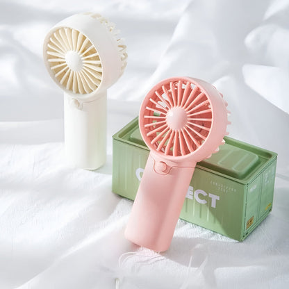 DecorsDeluxe ZenWave Traveler portable mini handheld fan with battery power, compact and travel-ready for cooling on the go.