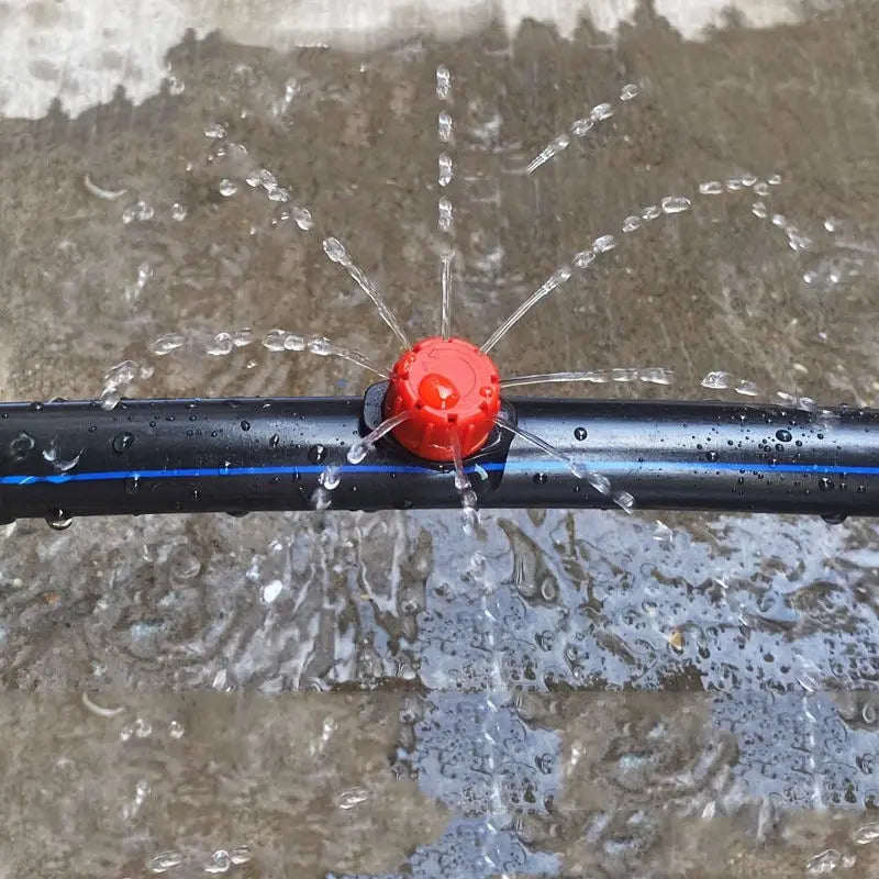 Set of 100 Mivoza drip irrigation drippers for precise, efficient watering of garden plants and outdoor irrigation systems.