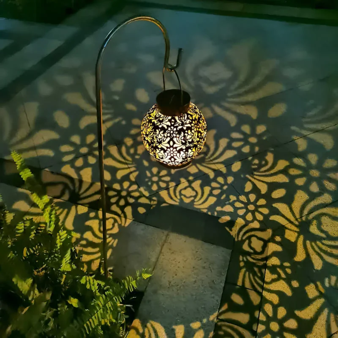 Weatherproof LED solar pendant light from Belro hanging outdoors, designed as a garden accessories umbrella light.