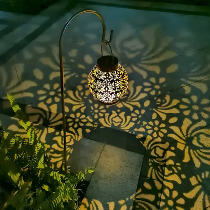 Weatherproof LED solar pendant light from Belro hanging outdoors, designed as a garden accessories umbrella light.