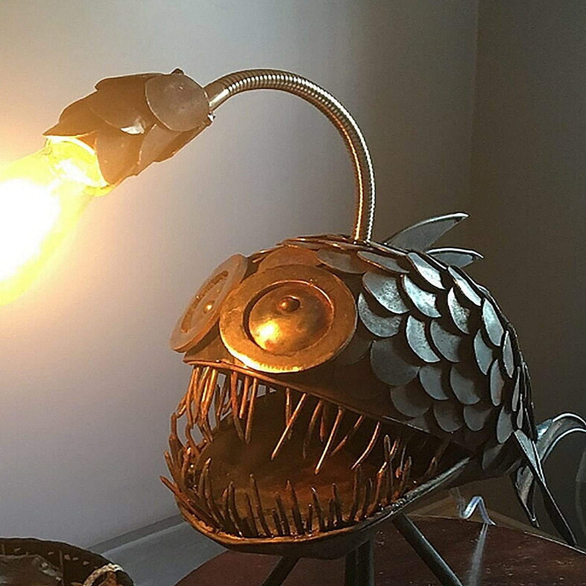 Belro Anglerfish lamp themed men's clothing, featuring a unique anglerfish design on the fabric, perfect for fans of quirky style.