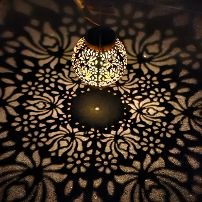 Belro weatherproof LED solar pendant light hanging outdoors, designed as garden accessories for illumination and ambiance.
