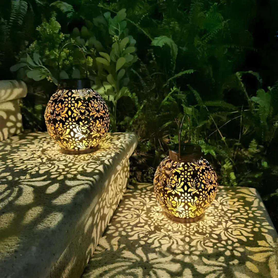 Belro weatherproof LED solar pendant light hanging from a garden umbrella, providing outdoor illumination and decorative lighting.