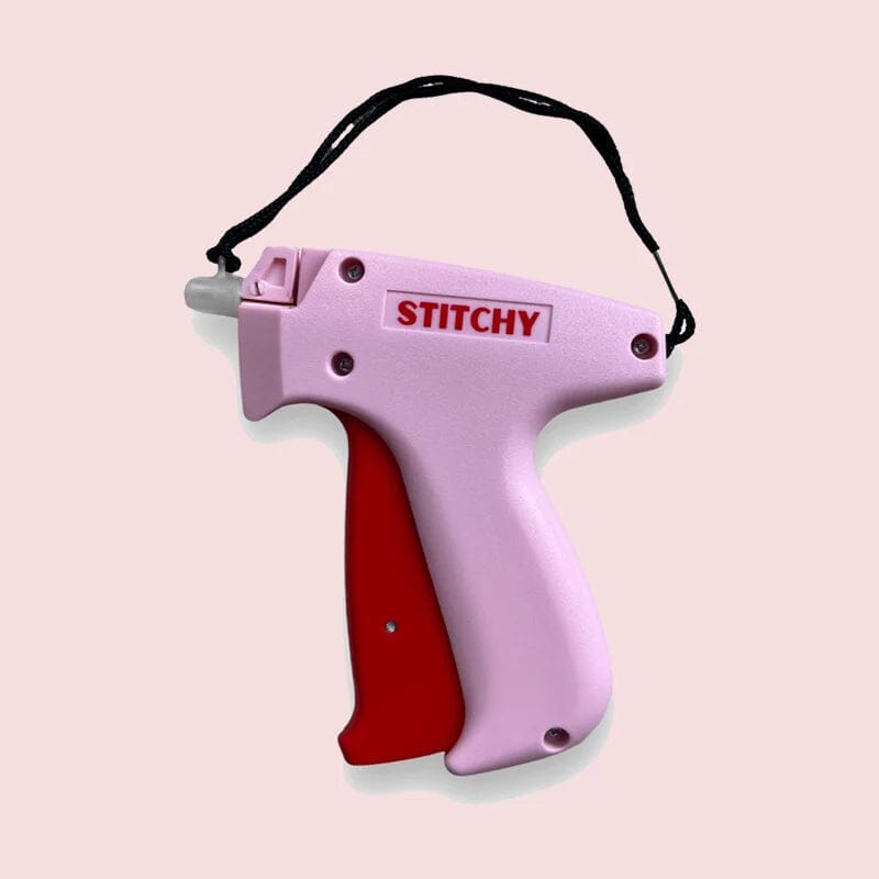 Belro Quick Clothing Fixer for men, compact portable repair tool for quick clothing repairs, shown in the image.