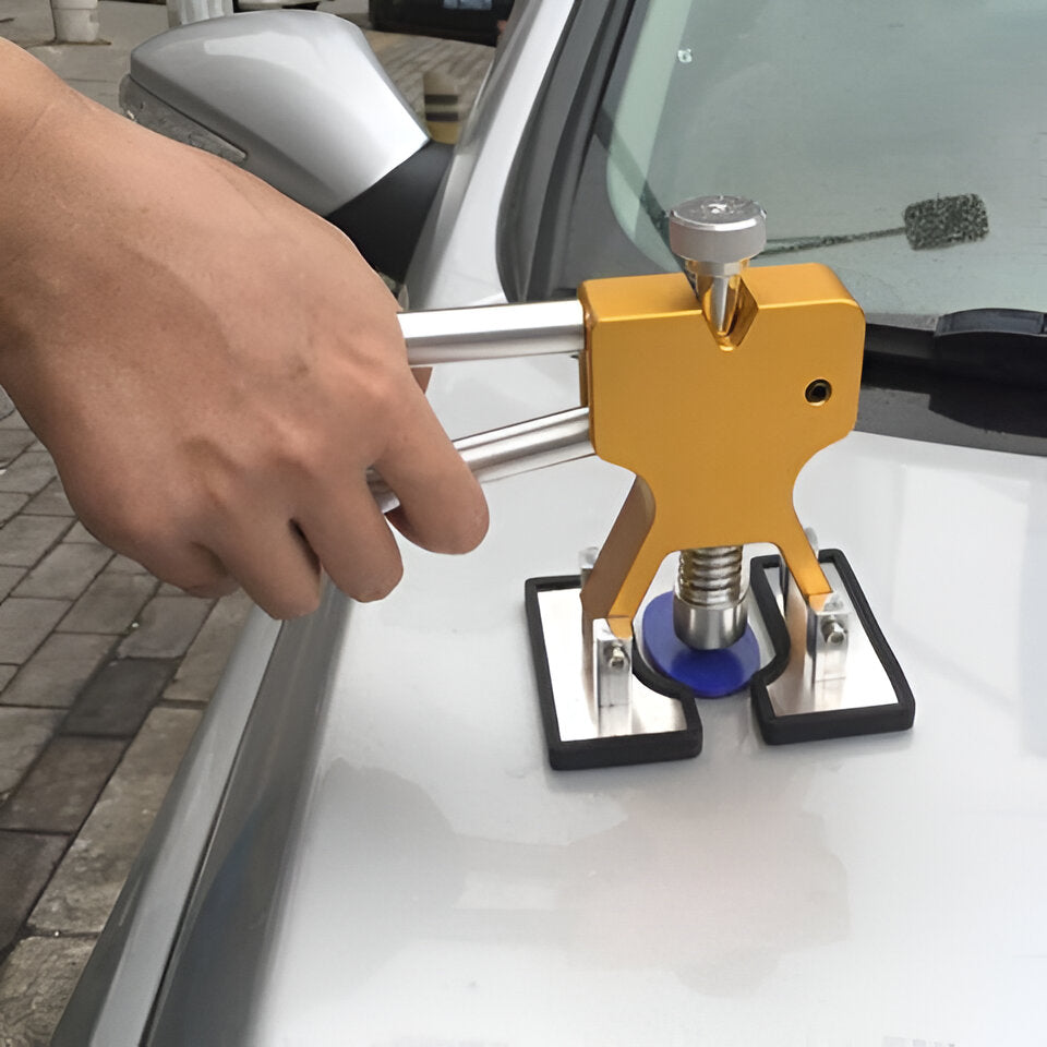 Belro paintless dent removal tools for home and garden, showing a set of dent repair tools on a workbench.
