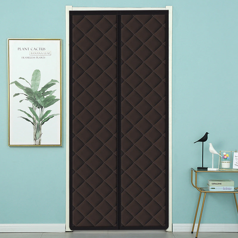 Belro magnetic thermal winter door insulation curtain hanging in a home, designed to block cold drafts and improve energy efficiency.