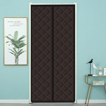 Belro magnetic thermal winter door insulation curtain hanging in a home, designed to block cold drafts and improve energy efficiency.