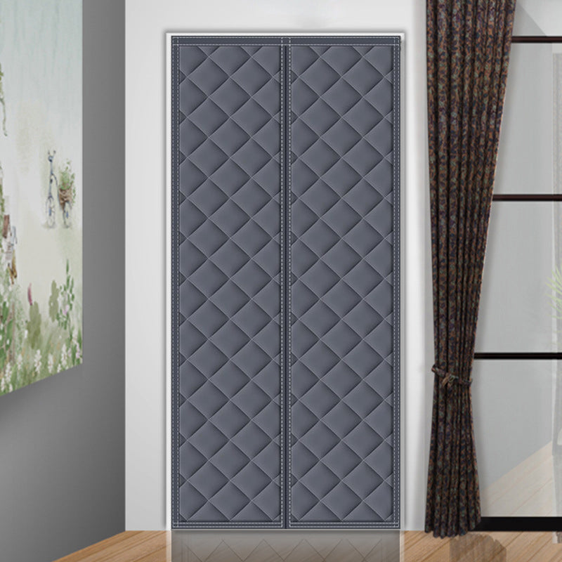 Belro Magnetic Thermal Winter Block Door Insulation Curtain hanging on a door to improve home energy efficiency and block cold drafts