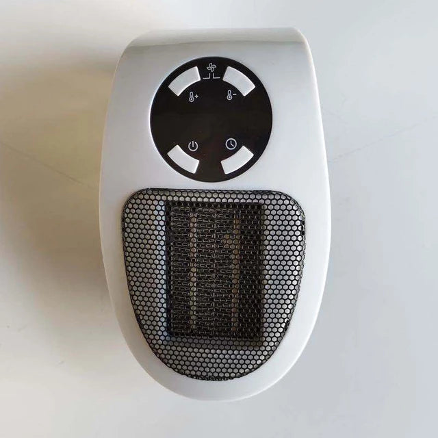 Belro mini portable electric plug-in personal room space heater on a table, compact and efficient home heating device.