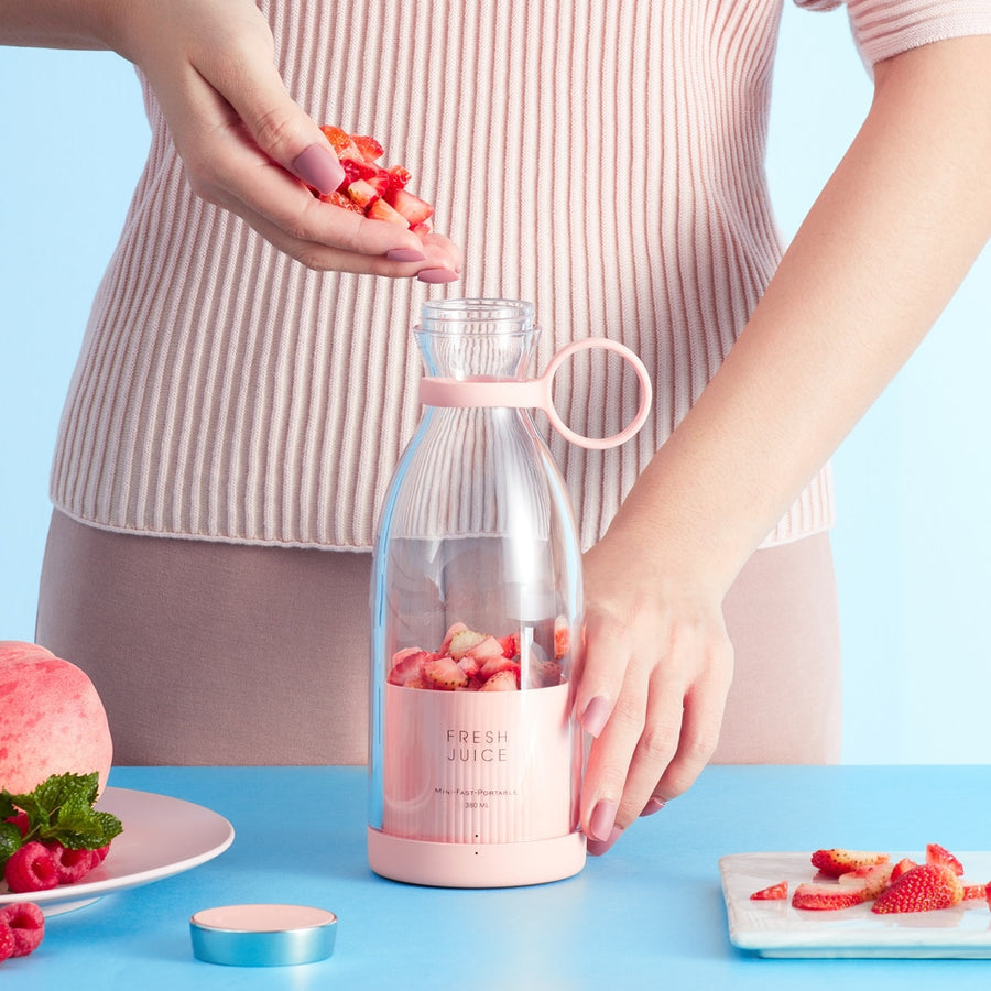 Belro portable electric fruit mixer and juicer blender showing compact design and blending jar for fresh fruit drinks