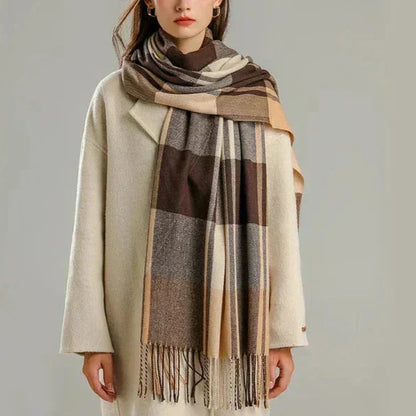 Soft, elegant beige cashmere scarf by BowLift, showcasing luxurious warmth and unisex winter style in a close-up image.