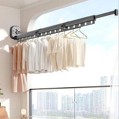 Belro cloth drying rack for laundry, with multiple metal bars for hanging clothes, in a home laundry room setting.