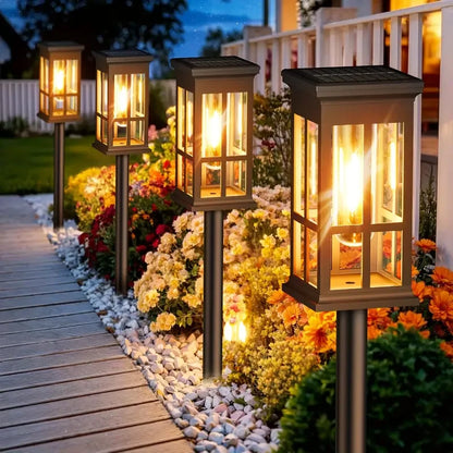 Set of two Mivoza solar pathway lanterns with filament look, auto on/off, ideal for garden lighting and outdoor pathways.