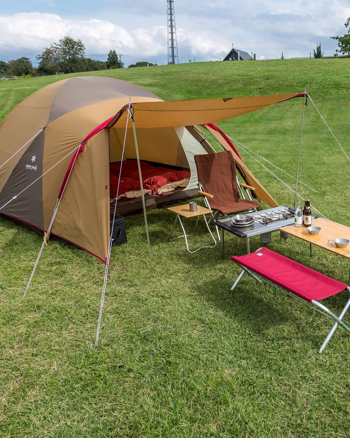 Casavibeo Snow Peak Amenity Dome tent set up outdoors, showcasing the compact, lightweight camping shelter for outdoor adventures.