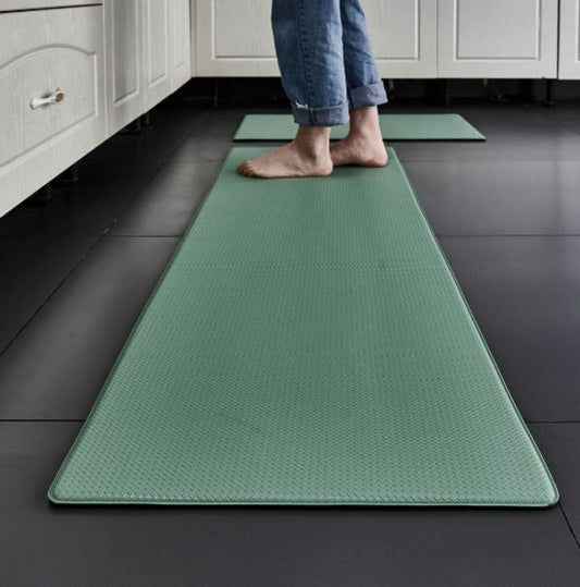 Softstance Mivoza anti-fatigue kitchen mat with cushioned support and non-slip surface for comfortable standing during cooking.