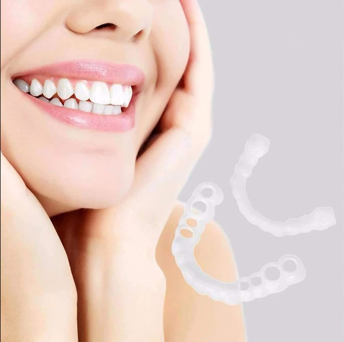 Adjustable snap-on dentures by Belro, designed for comfortable oral fit, shown in a close-up of the denture appliance.
