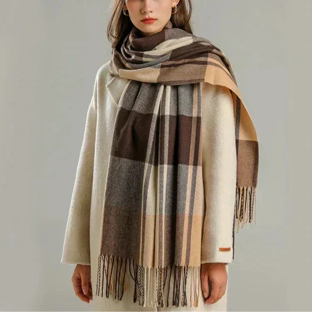 Soft beige luxury cashmere scarf by BowLift, elegant unisex winter accessory with warm, cozy, and lightweight feel.