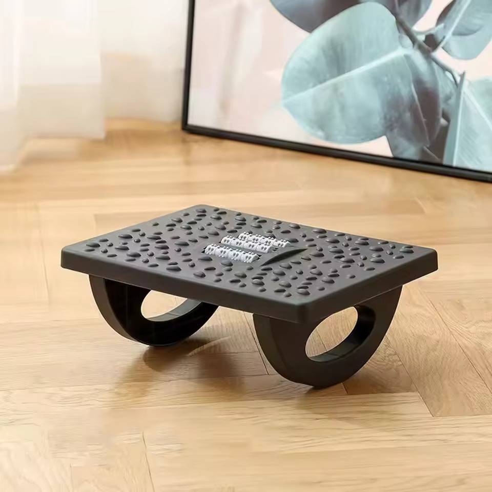 Belro under desk foot rest accessory with ergonomic design, providing comfort and support for improved sitting posture.