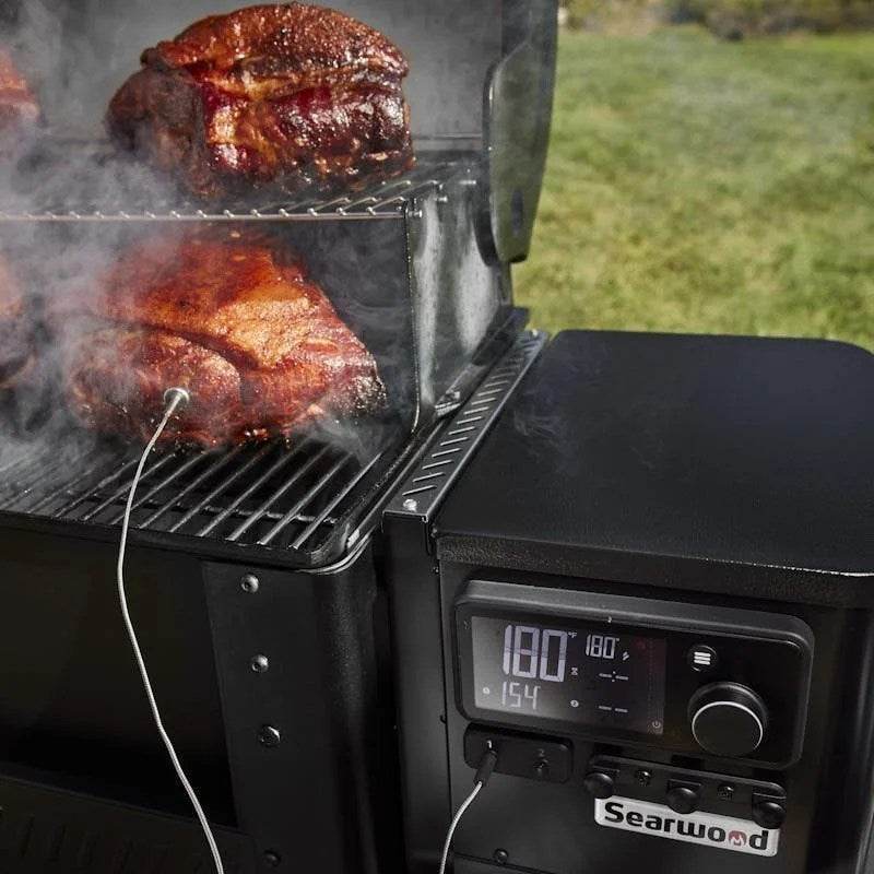 Casavibeo Weber Grill Searwood 600 Pellet with bone-in pork shoulder cooking on the grill.
