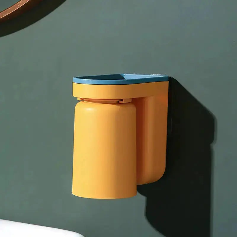 Wall-mounted Mivoza adhesive toothbrush holder in bathroom, featuring sleek, no drill design for organized oral hygiene storage.