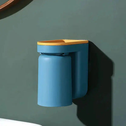 Wall-mounted Mivoza adhesive toothbrush holder for bathroom organization, featuring a sleek, no-drill design with dual storage.