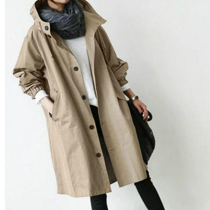 Windproof women's trench coat by BowLift, hooded waterproof outdoor jacket, water-resistant beige trench with storm design.